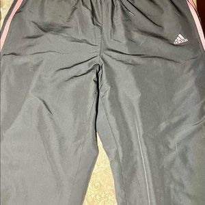 Iconic adidas black w/ pink stripes straight leg track pants.